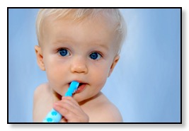 baby brushing his teeth sealants